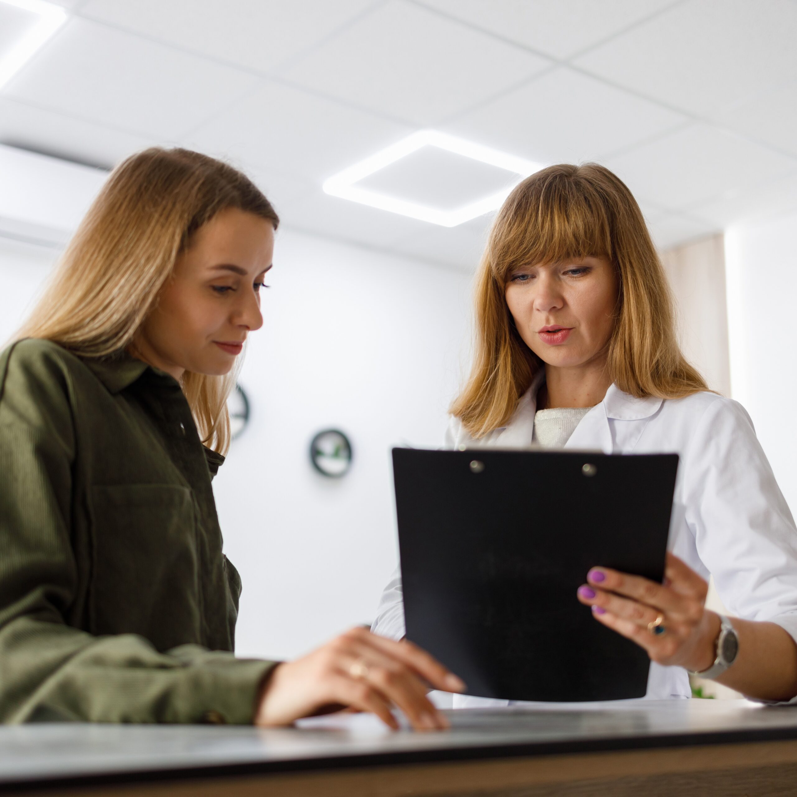 bigstock-Medical-Receptionist-Gives-For-464836731 A woman talking with a Women’s Pregnancy Center employee about how abortion pill reversal works