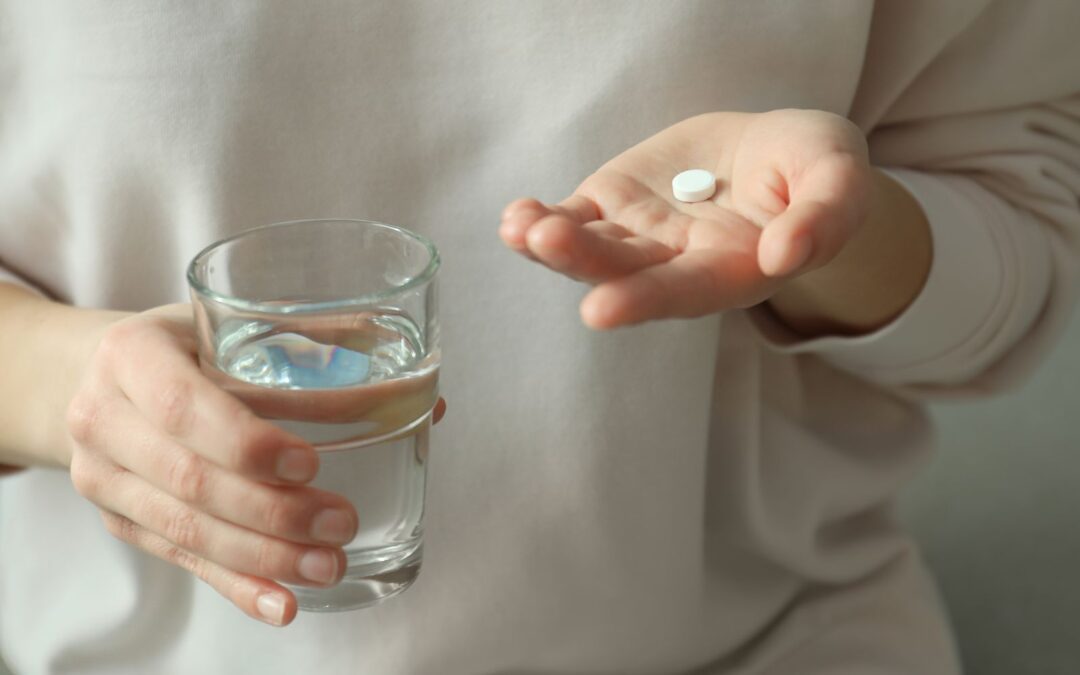 woman taking abortion pill